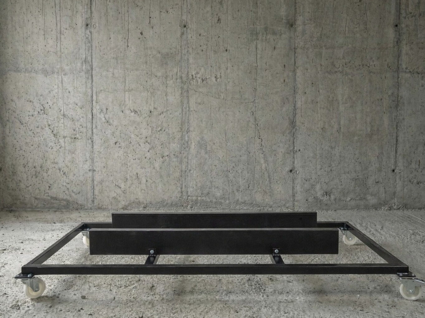 Premium black powder coated Kipac boat dolly with polyethylene bunks for boat dealerships